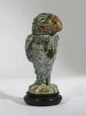 Appraisal: A Martin Brothers stoneware bird jar and cover by Robert