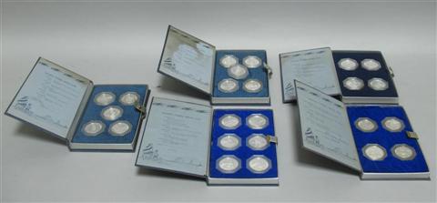 Appraisal: SERIES OF FIVE VOLUMES OF COINS Commemorative coins of the