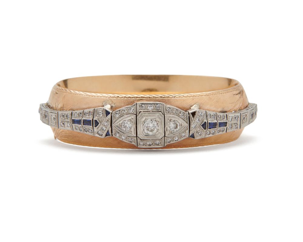 Appraisal: K Gold Diamond and Sapphire Bangle Bracelet centering an applied