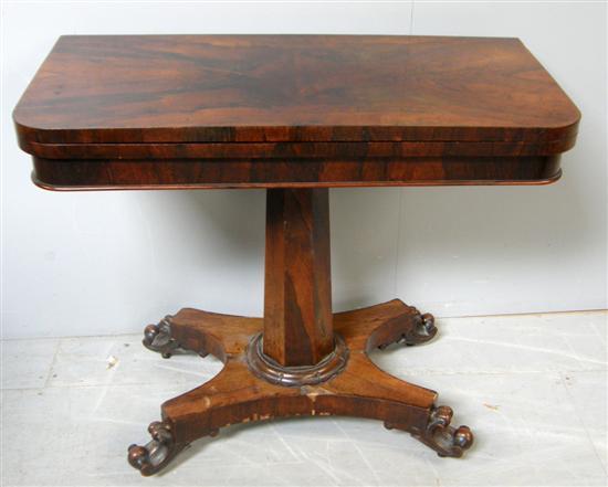 Appraisal: th century rosewood card table on hexagonal column support and