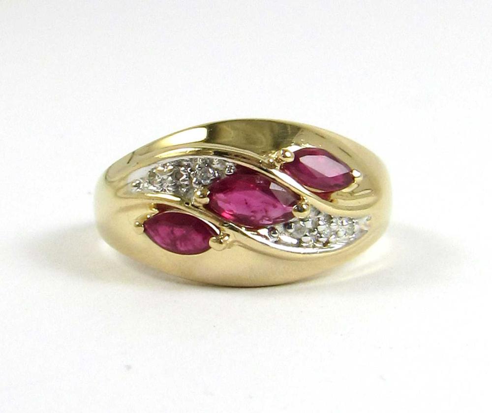 Appraisal: RUBY AND DIAMOND RING Marquise-cut red rubies ct total Round