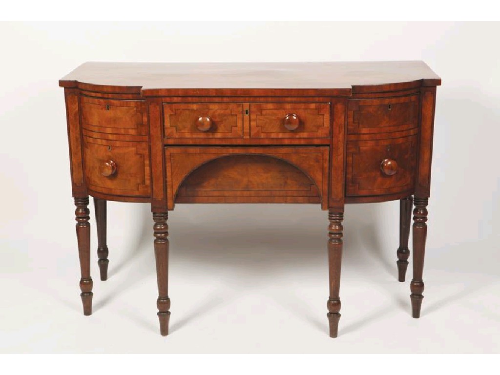 Appraisal: A REGENCY MAHOGANY SIDEBOARD with a shaped front incorporating two