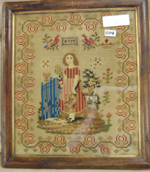 Appraisal: A Victorian embroidery of a young girl at a cottage