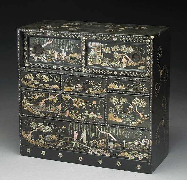 Appraisal: A small Ryukyu Island black lacquered wood tansu with mother-of-pearl