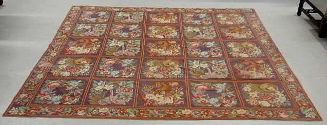 Appraisal: Colorful needlepoint floor cover with twenty-five blocks of floral patterns