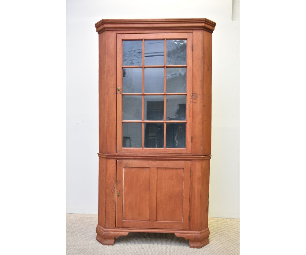 Appraisal: Pennsylvania Paint Decorated Corner Cupboard Pennsylvania paint decorated two-piece corner