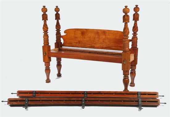 Appraisal: CARVED BED American th century mahogany Baluster and fruit-carved posts