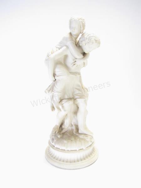 Appraisal: Porcelain Figural Statue depicting boy carrying girl on his back