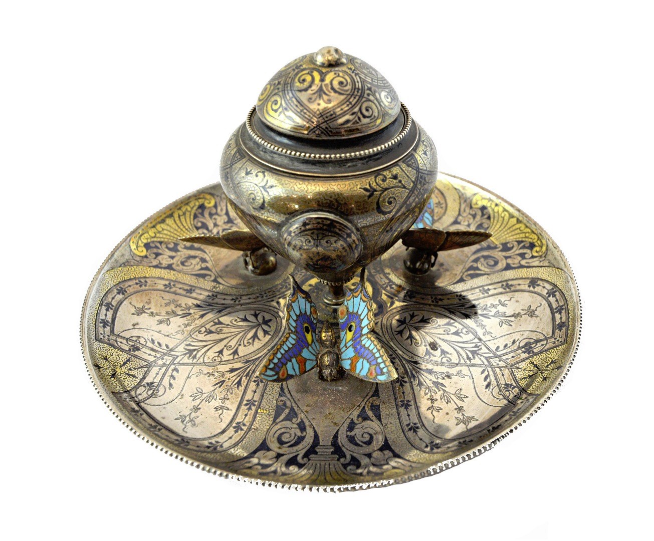 Appraisal: A circular niello decorated desk inkstand the central inkwell with