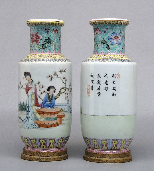 Appraisal: A pair of small famille-rose porcelain cylindrical vases th Century