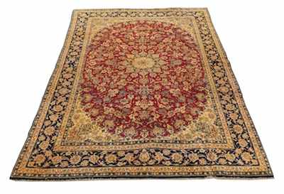 Appraisal: An Isfahan Rug Busy foliate patterning contrasting gold tones with