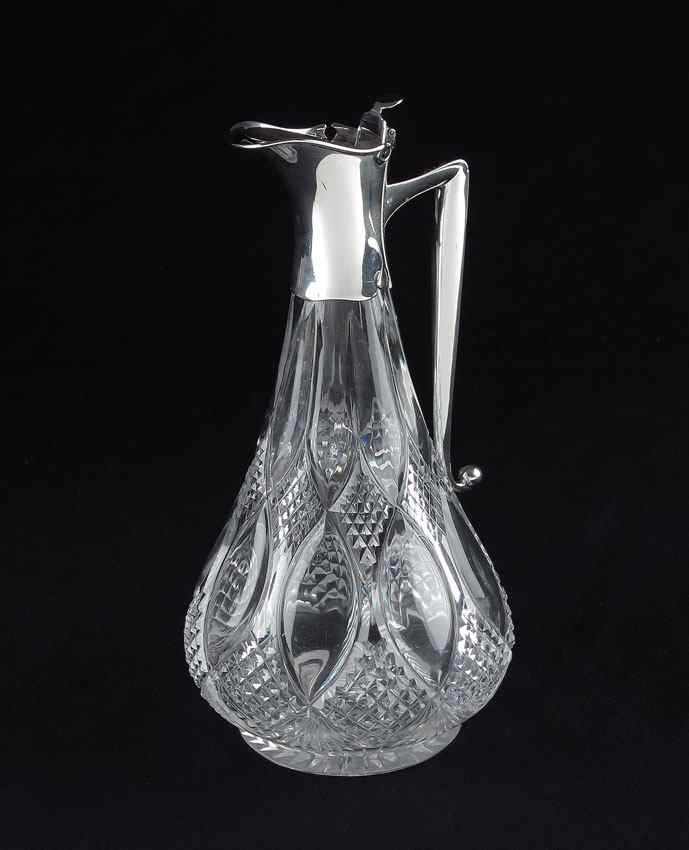 Appraisal: JOHN GRINSELL SONS ENGLISH SILVER MOUNTED CLARET JUG Silver mounted