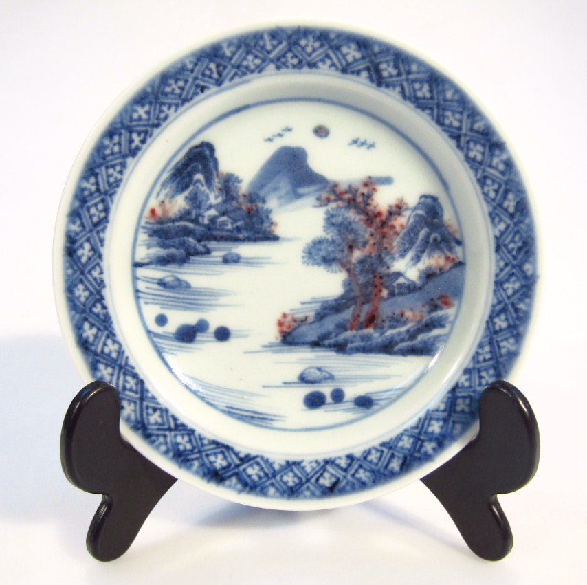 Appraisal: A Chinese blue and white porcelain saucer dish with outer