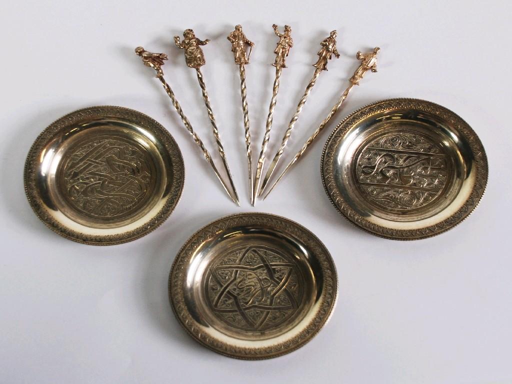 Appraisal: SET OF SIX SILVER COCKTAIL STICKS with 'Dickens' figural tops