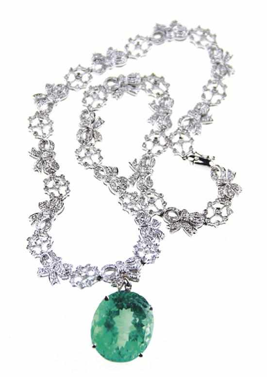 Appraisal: Emerald and diamond necklace diamond-set K white gold ribbon and