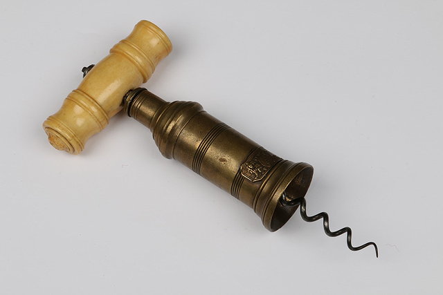 Appraisal: A THOMASON STYLE BRASS BARRELLED CORKSCREW with turned bone handle