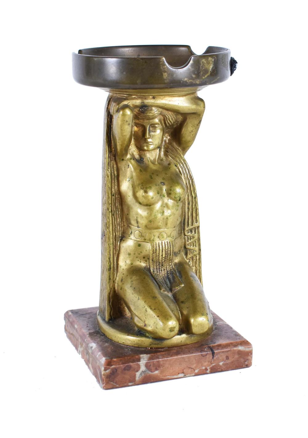 Appraisal: AUSTRIAN GILT BRONZE FIGURAL ASH TRAYCirca Appears unsigned The scantily-clad