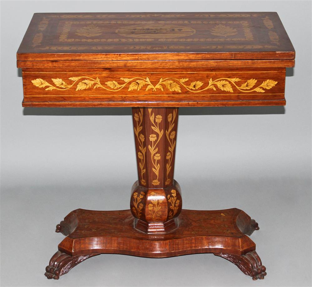 Appraisal: LATE NEOCLASSICAL STYLE MARQUETRY GAMES TABLE WITH FACETED PEDESTAL SUPPORT