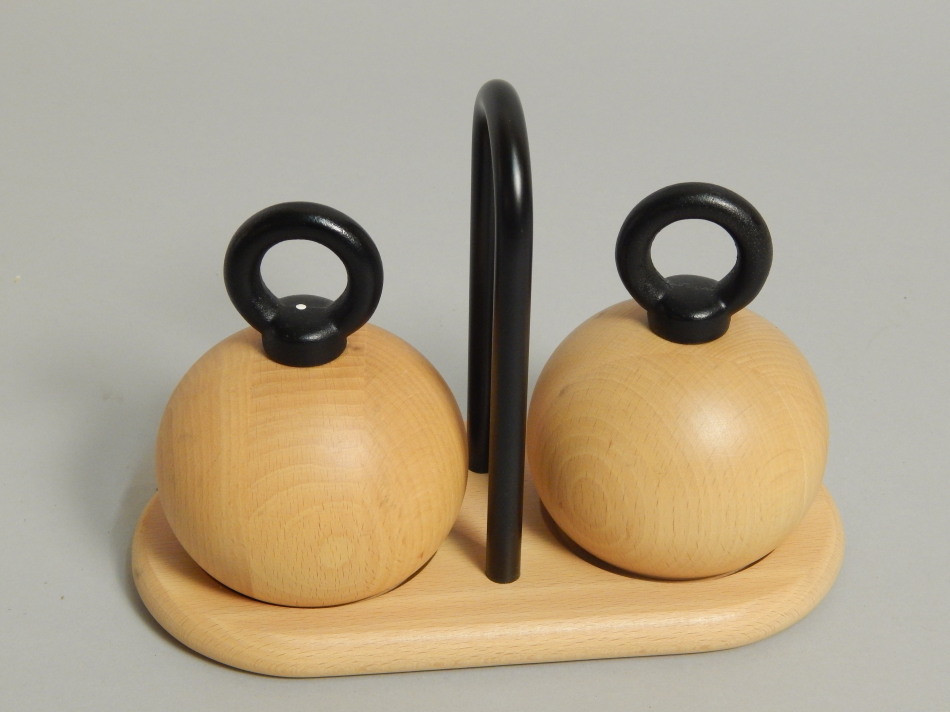 Appraisal: A Danish turned beech and ebonised s cruet designed by