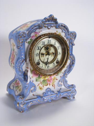 Appraisal: Antique china mantle clock Ansonia with floral decorated case tin