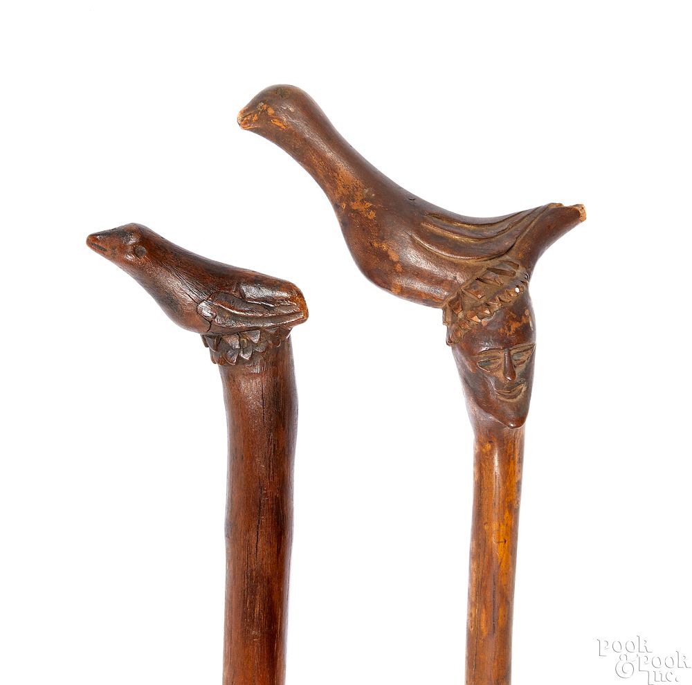 Appraisal: Schtockschnitzler Simmons two carved canes Schtockschnitzler Simmons Berks County Pennsylvania