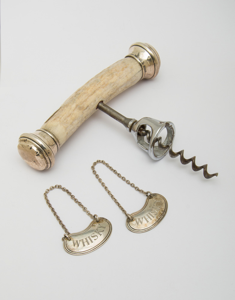 Appraisal: GROUP OF BAR IMPLEMENTS AND ACCESSORIES Comprising a sterling-tipped horn-handled