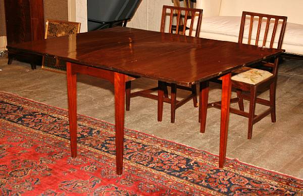 Appraisal: A George III style mahogany drop leaf table