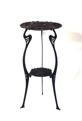 Appraisal: A German cast iron side table the shaped circular top