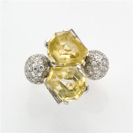 Appraisal: Rose Gold Platinum Yellow Sapphire and Diamond Crossover Ring Estimate