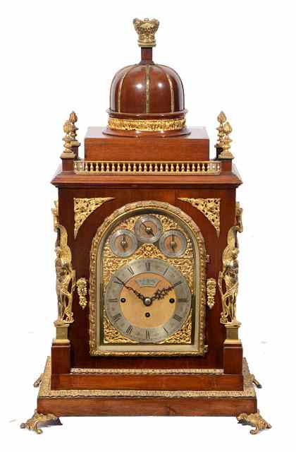 Appraisal: A MAHOGANY BOARDROOM CLOCK the arched gilt dial with silvered