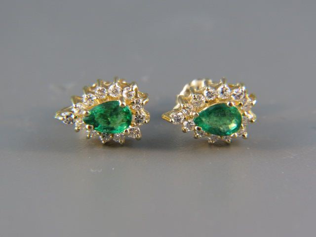 Appraisal: Emerald Diamond Earrings pear shaped emeralds totaling carat surrounded by