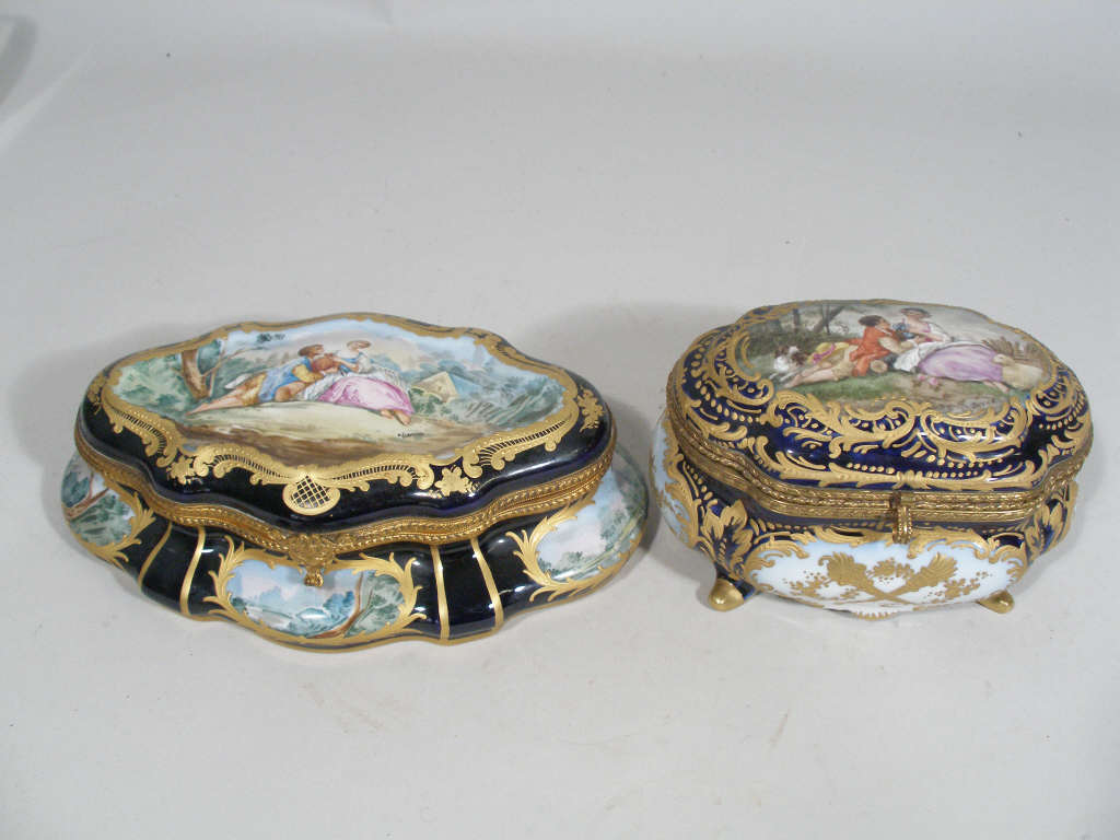 Appraisal: Two French Dresser Boxes Sevres Style c hand decorated porcelain