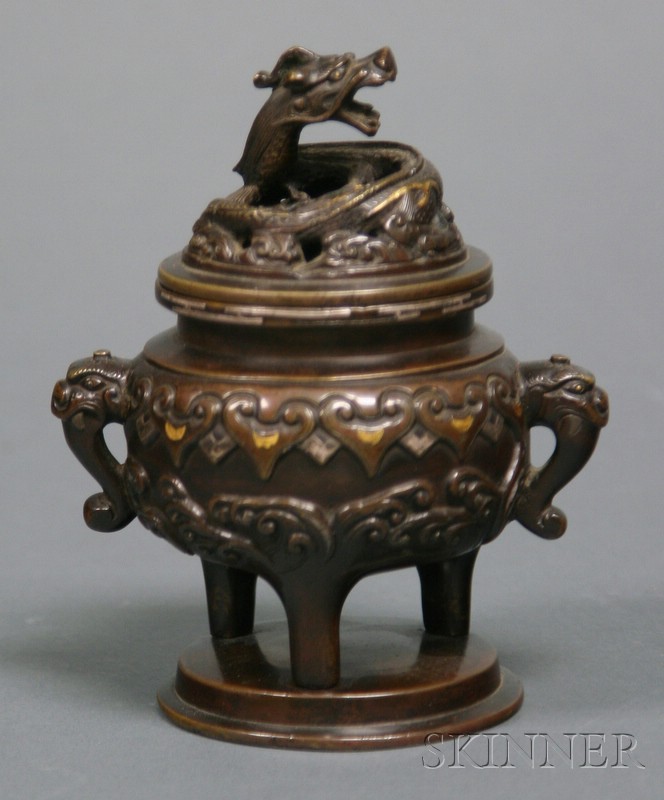 Appraisal: Bronze Incense Burner Japan th century dragon top tripod base