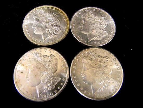 Appraisal: COINS four mixed date Morgan dollars all uncertified average grade