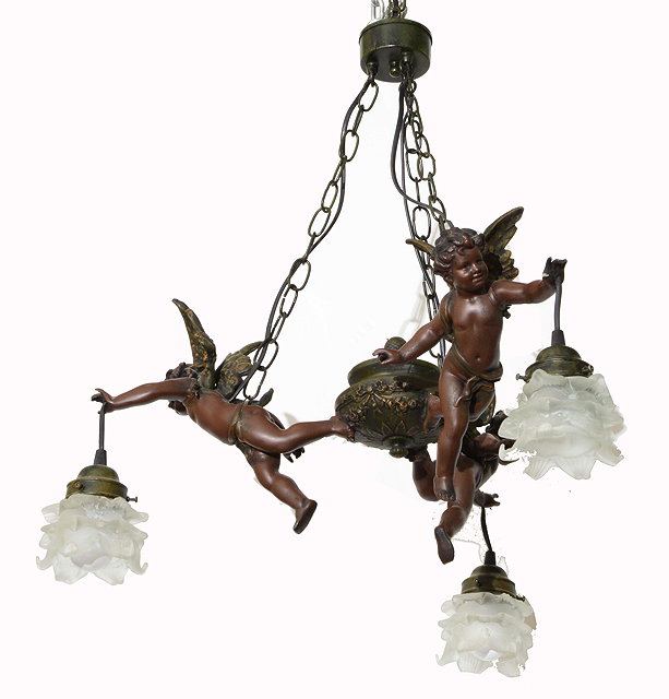 Appraisal: A HANGING CEILING LIGHT with chains supporting three winged cherubs