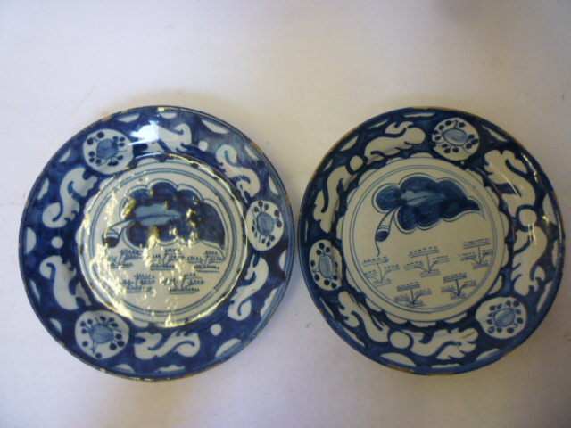 Appraisal: A PAIR OF DUTCH DELFT PLATES late th century painted