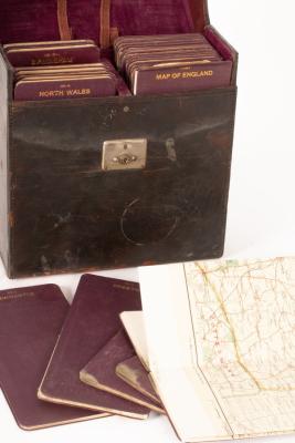 Appraisal: A leather cased set of English regional maps with hunt