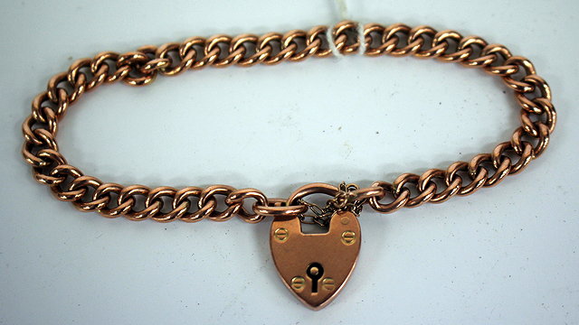 Appraisal: A CT GOLD BRACELET with padlock clasp