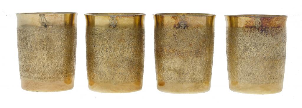 Appraisal: ROYAL A SET OF FOUR GEORGE III SILVER GILT BEAKERS