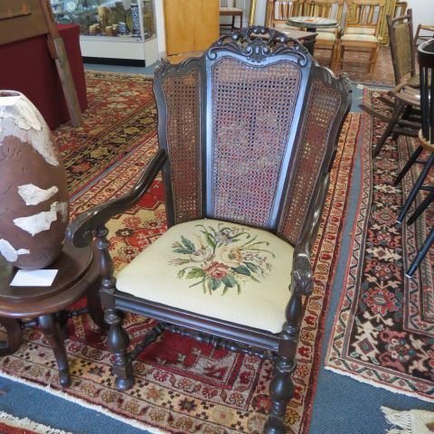 Appraisal: Antique Carved Chair wingback style cane seat and back plus