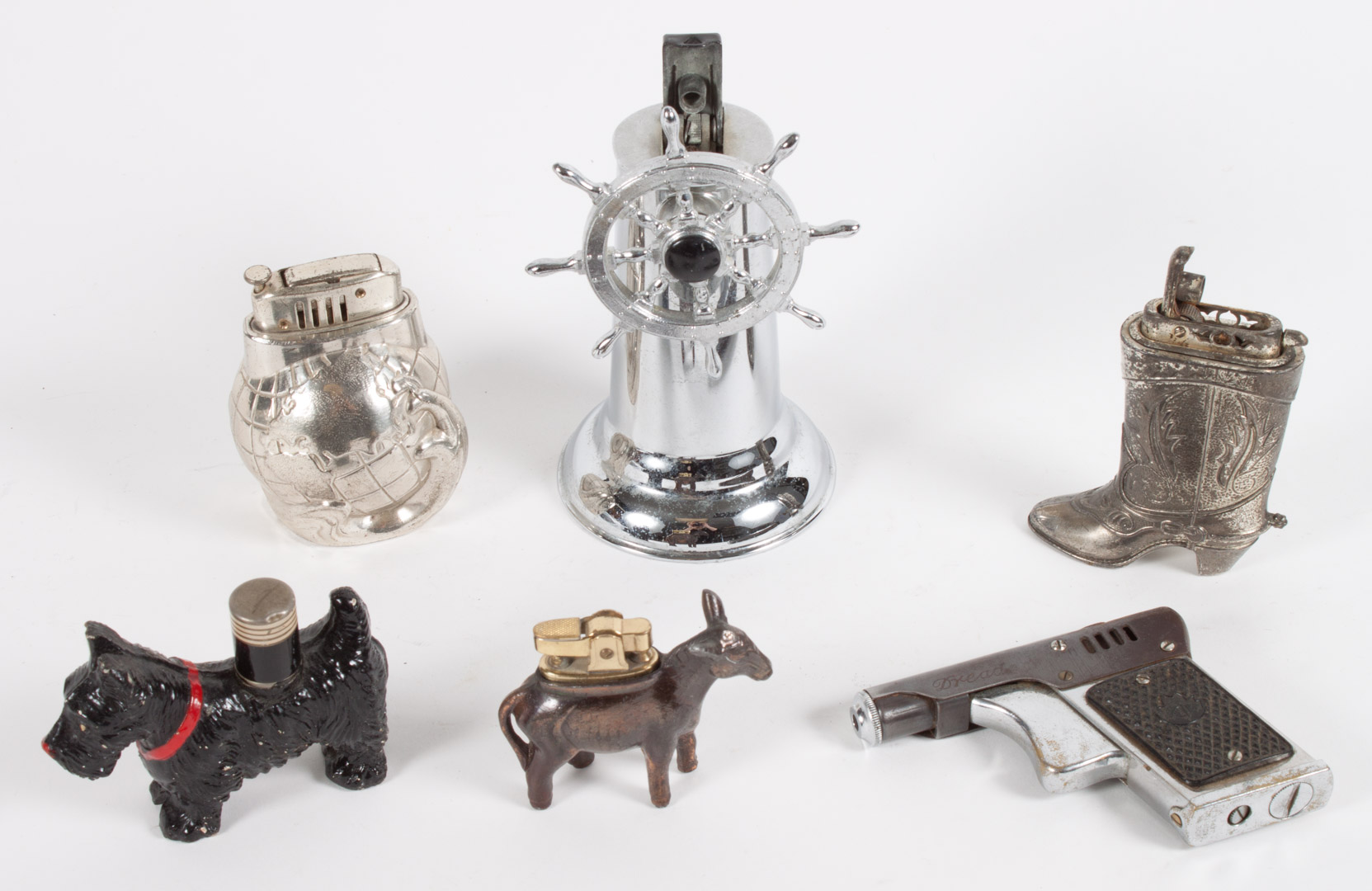 Appraisal: Six figural cigarette lighters s- s includes western boot donkey