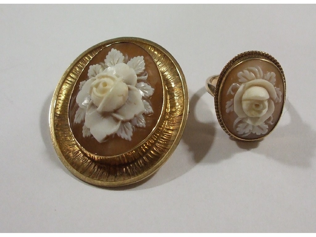 Appraisal: Nine carat gold floral cameo set dress ring and a