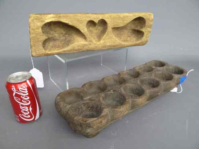 Appraisal: Early primitive heart mold along with another primitive footed wooden