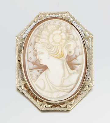 Appraisal: A Carved Shell Cameo Signed k white gold filigree frame