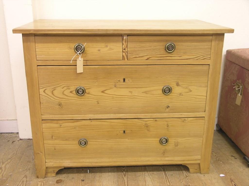 Appraisal: A th century French waxed pine bedroom chest two short