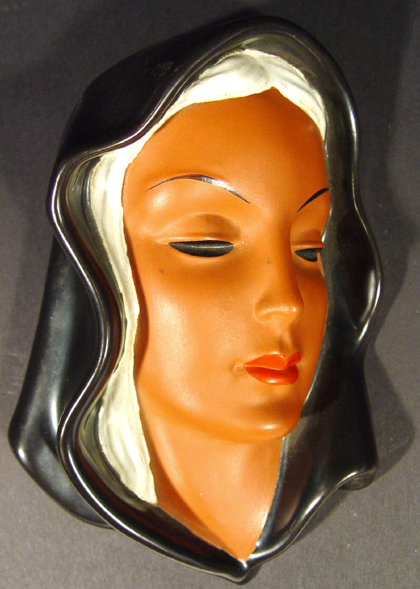 Appraisal: Art Deco Goldscheider wall mask of a veiled maiden with