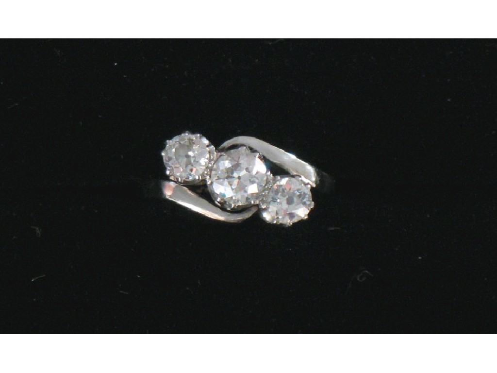 Appraisal: A THREE STONE DIAMOND DRESS RING the three round graduated