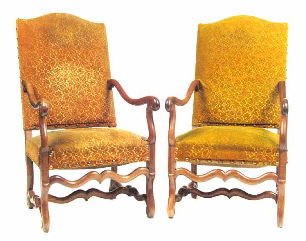 Appraisal: A pair of Renaissance style armchairs height in width in