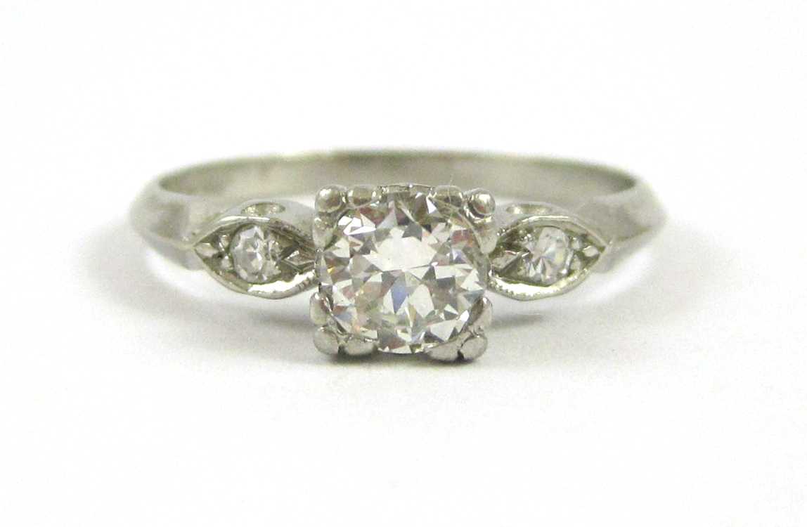 Appraisal: DIAMOND AND PLATINUM RING with a round single-cut diamond set