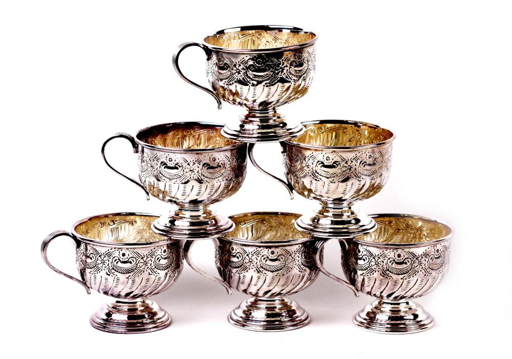 Appraisal: SIX ENGLISH SHEFFIELD SILVER PLATE FOOTED CUPSMarked Each circular bowl